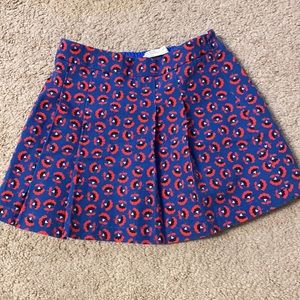 Blue skirt with red and black flowers